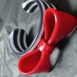 Acrylic black and white bracelet with big red bow.